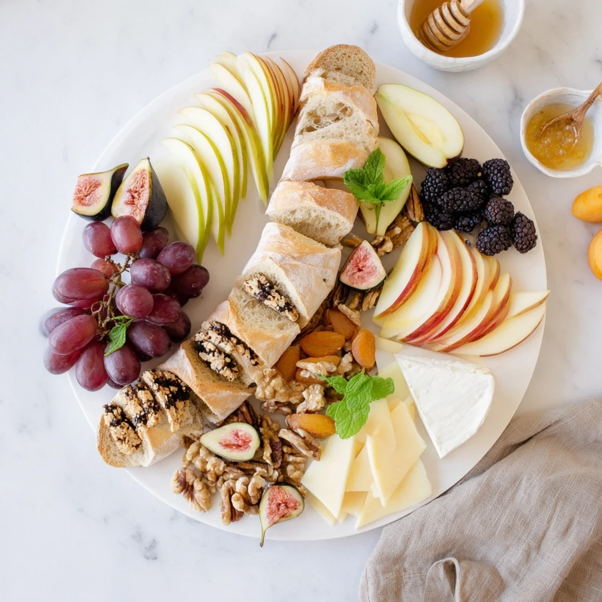 A beautifully arranged Harvest Scythe showcases crusty breads, ripe fruits, and grains for snacking.
