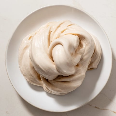 A close-up of creamy 2-Ingredient Banana Ice Cream, ready to be enjoyed as a refreshing treat.