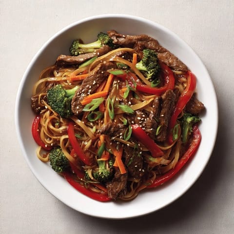 Savory stir-fried Easy Beef Stir-Fry with Lo Mein Noodles, featuring tender beef and colorful vegetables.