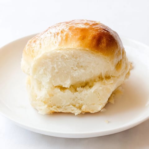 These Quick-Rise Dinner Rolls are pillowy and warm, perfect served alongside a hearty, family-style meal.